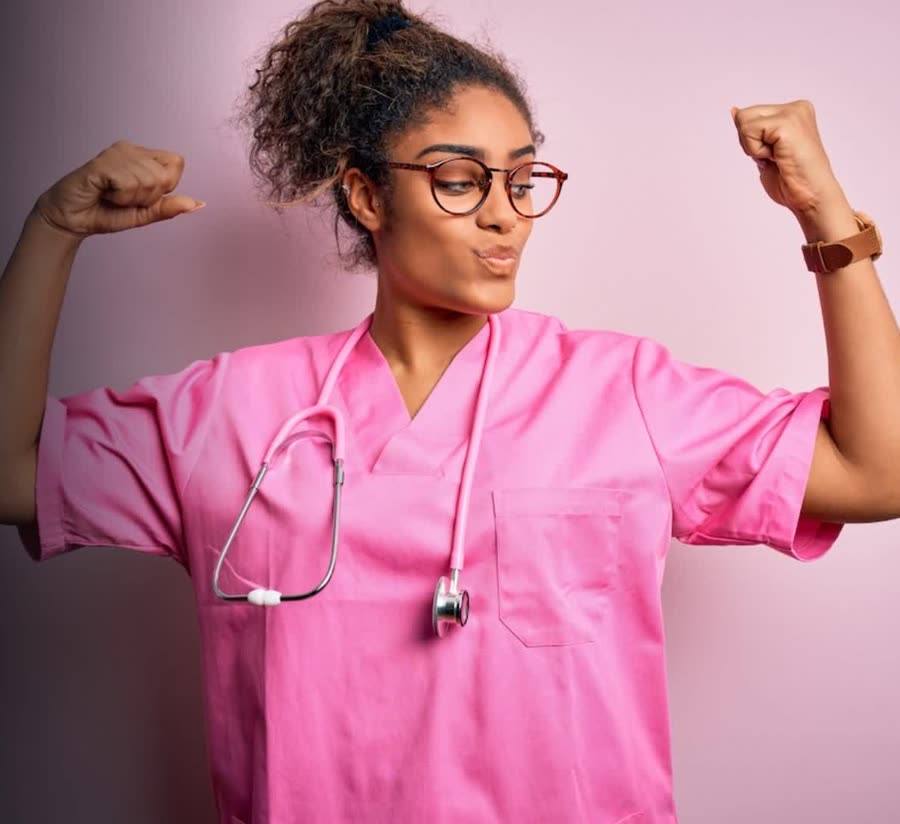 Sam, a nursing assistant, celebrating